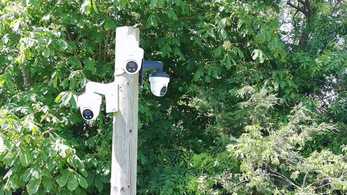 Secure industrial site entrance with CCTV