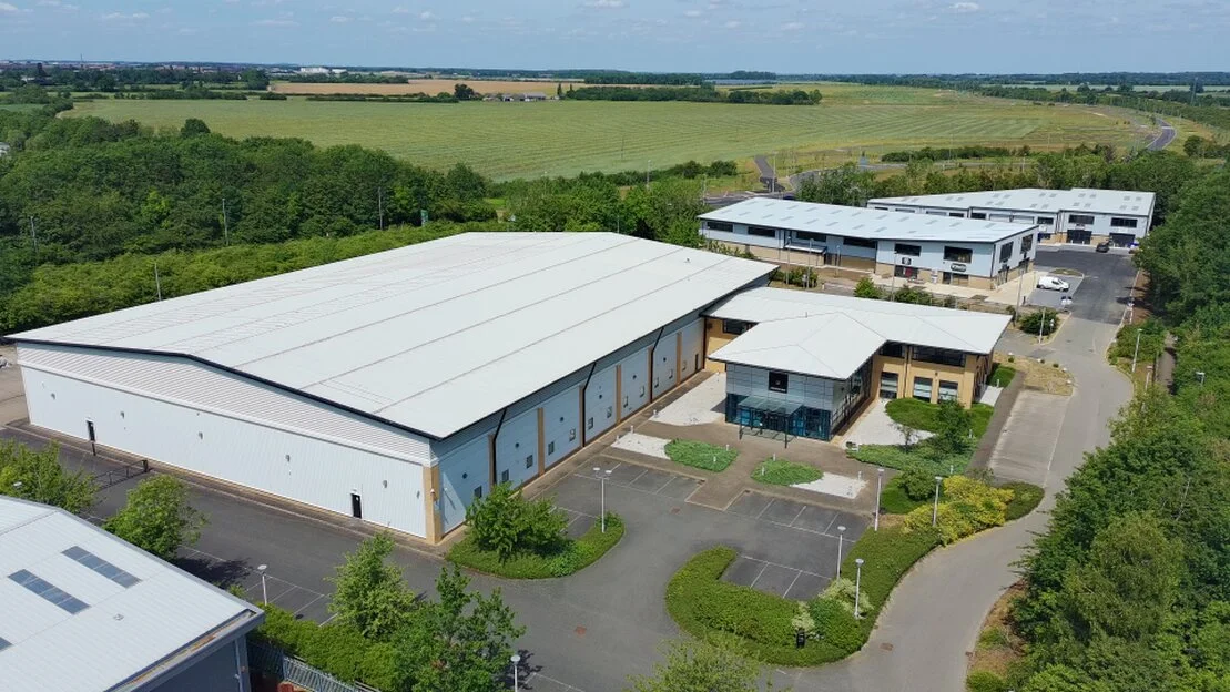 Row of industrial units with roller shutter doors
