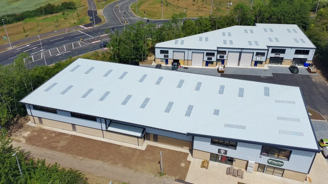 Row of industrial units with roller shutter doors