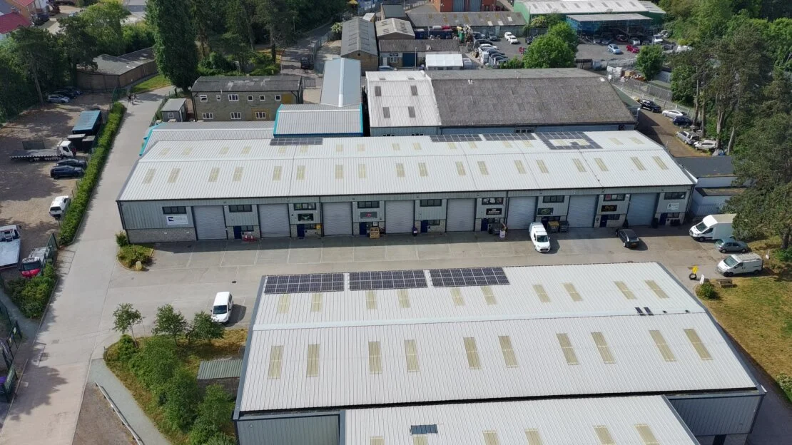 Exterior view of Buntingford industrial units with yard and roller shutters